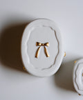 ౨ৎ Bowknot Melted White Porcelain Gold Dot Lid Box